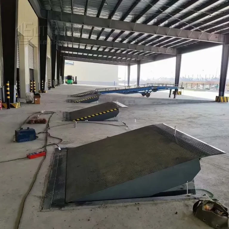 Electric loading dock leveler installation at logistics facility