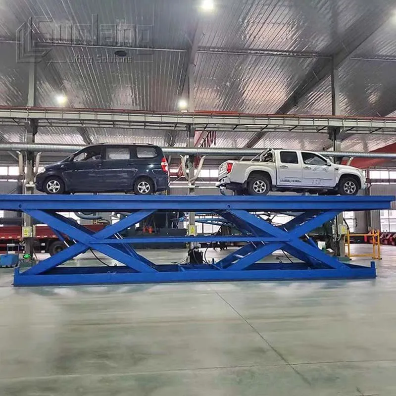 Large scissor car lift platform undergoing factory test for industrial vehicle lifting