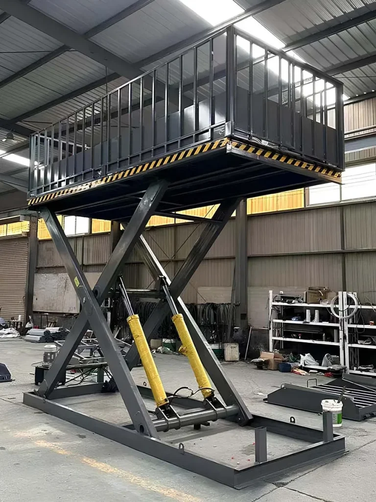 Hydraulic lift table with guardrail undergoing factory testing